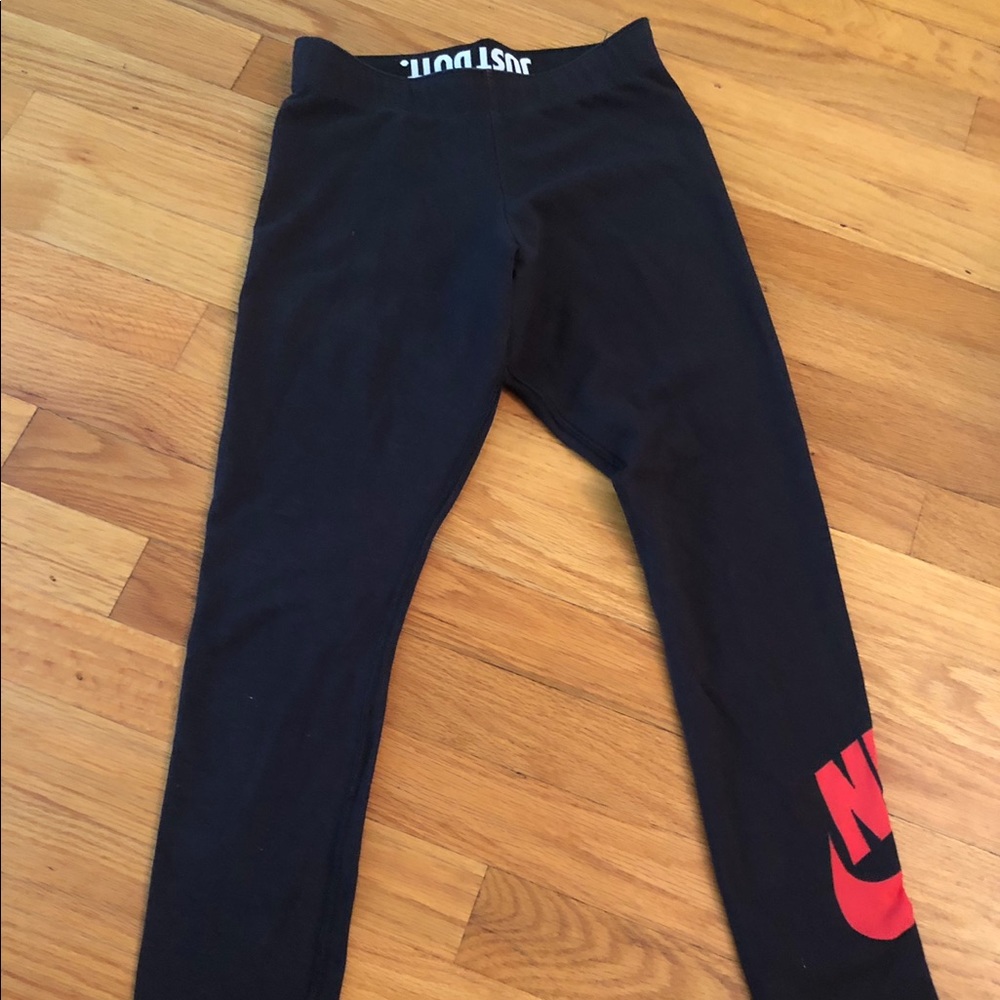 Nike - running pants. Black w/ red inside and logo